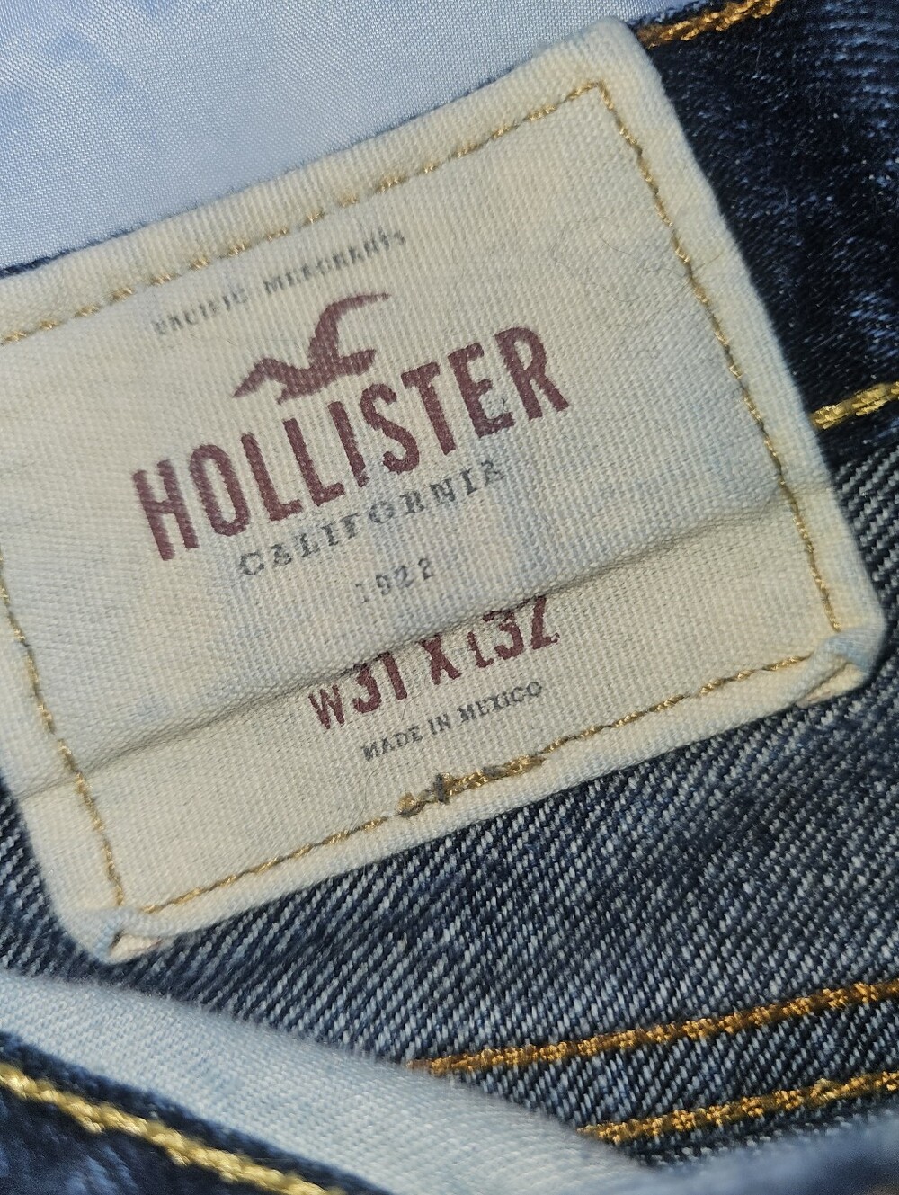 Hollister Jeans Label in Blue Denim with Gold Stitching